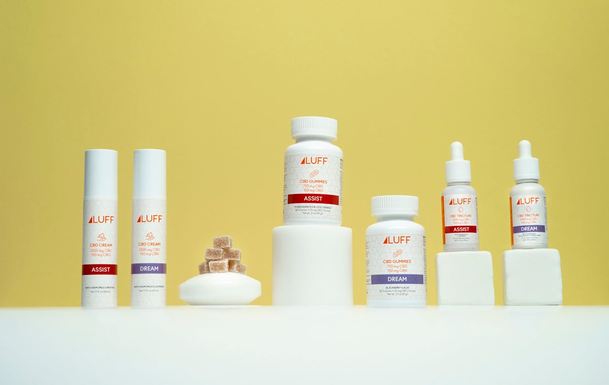 white plastic bottles on white ceramic sink