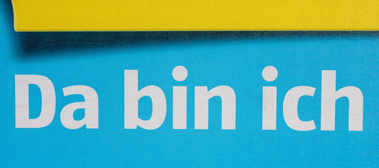 a blue and yellow sign