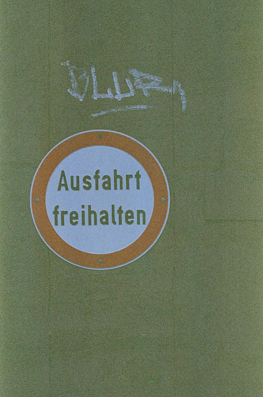 a picture of a sign that is on the side of a building