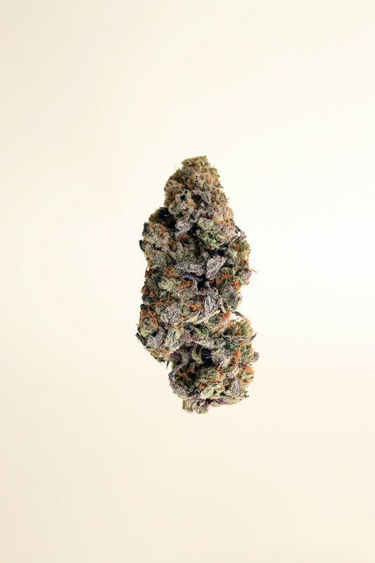 a pile of weed sitting on top of a white table